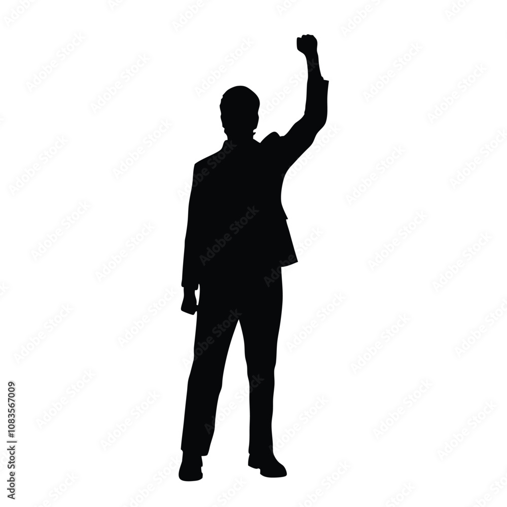 Obraz premium A man is standing in front of a white background. He is wearing a suit and is holding his fist up in the air