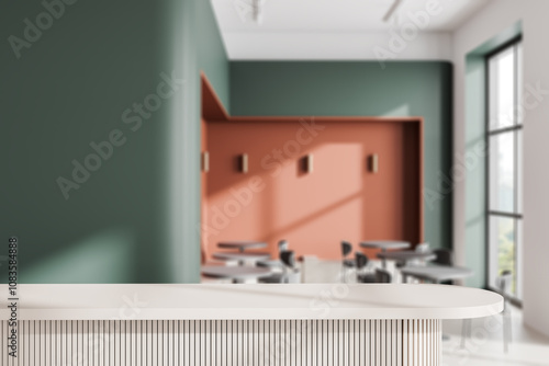 Stylish cafe interior with empty counter, dining space with panoramic window photo