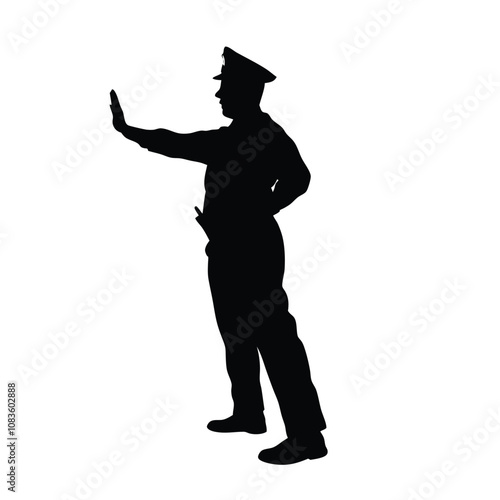 A police officer is standing in front of a white background. He is holding a hand up in the air