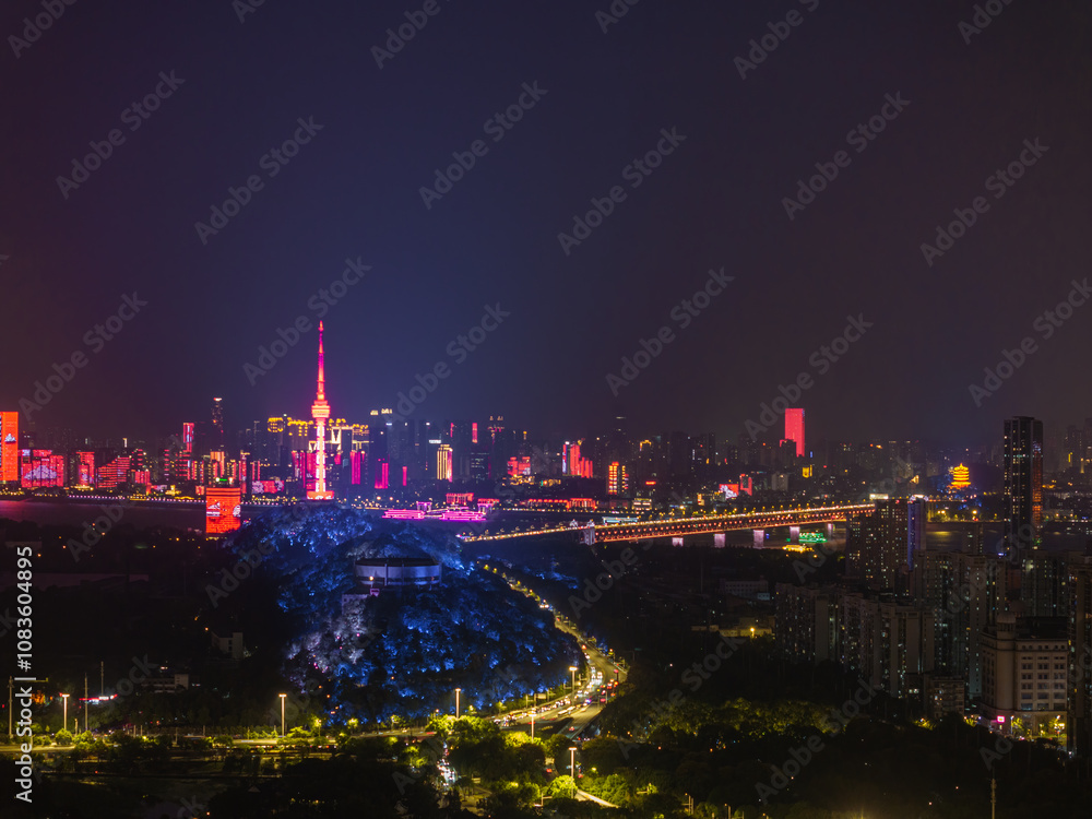 Fototapeta premium Night view of the landmark city on the two rivers and four banks of Wuhan, China