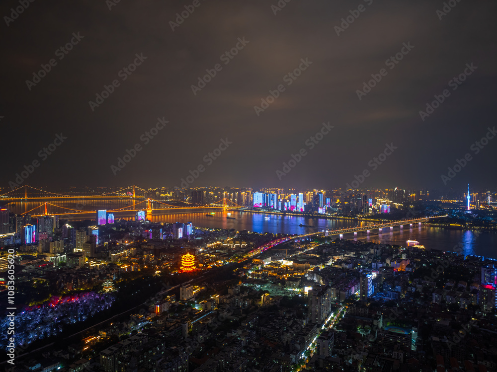 Fototapeta premium Night view of the landmark city on the two rivers and four banks of Wuhan, China