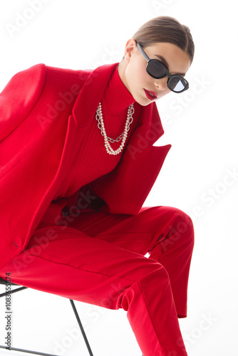 Fashion woman in trendy red outfit. photo