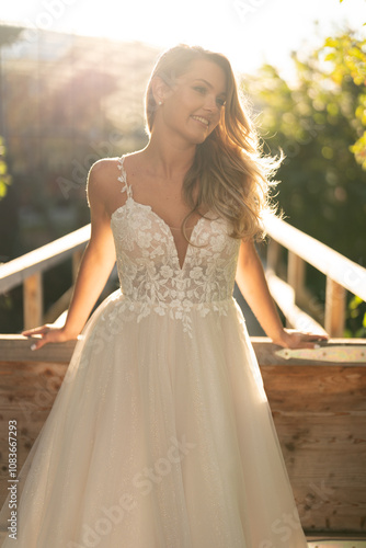 Beautiful bride on white wedding dress  photo