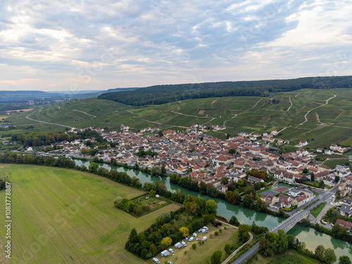 Panoramic aerial view on green premier cru champagne vineyards and fields near village Hautvillers and Cumieres and Marne river valley, Champange, France photo