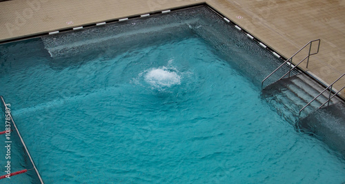 Thermal pool with hot, blue water, outdoors in a thermal complex in the Czech Republic
