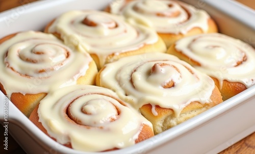 Delicious cinnamon rolls with cream frosting photo