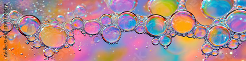 A close-up of colorful bubbles on the surface of a watering hole, in the African savanna. photo