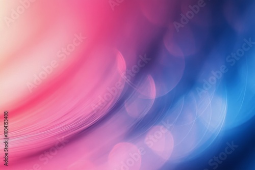 Soft swirls of pink and blue hues create a dreamy abstract background with ge...