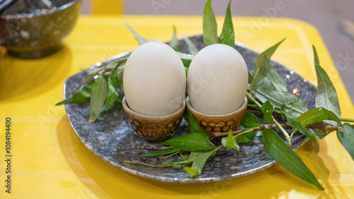 Vietnam street food. A bowl of duck eggs. Balut (boiled duck developing embryo) - Unique dishes in East Asian countries photo