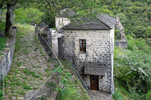 View of the old Monastery of the Dormition of Virgin or Koimisis tis Theotokou at the traditional village of Vrosina in Epirus, Greece photo