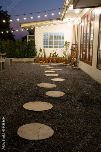 Pathway lighting installation outdoor garden photography evening ambiance perspective modern design for relaxation photo