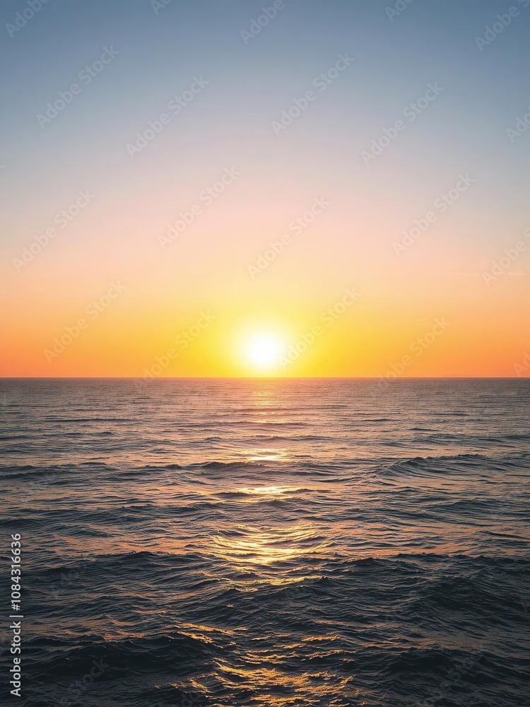 Obraz premium Vibrant sunset over the ocean with a beautifully curved horizon, ocean, reflections