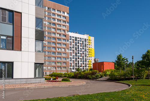 Modern Multi-Story Building with Colorful Exterior photo