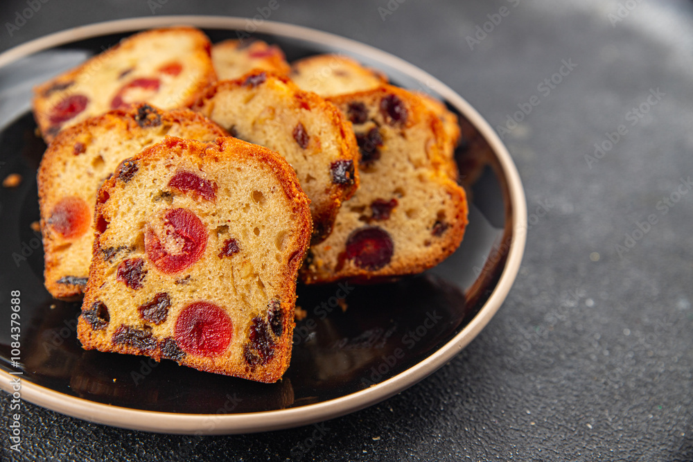 Fruit cake dessert sweet dried fruit traditional pastry, nuts meal food snack on the table copy space food background rustic top view Fruit cake dessert sweet dried fruit traditional pastry, nuts meal food snack on the table copy space food background rustic top view