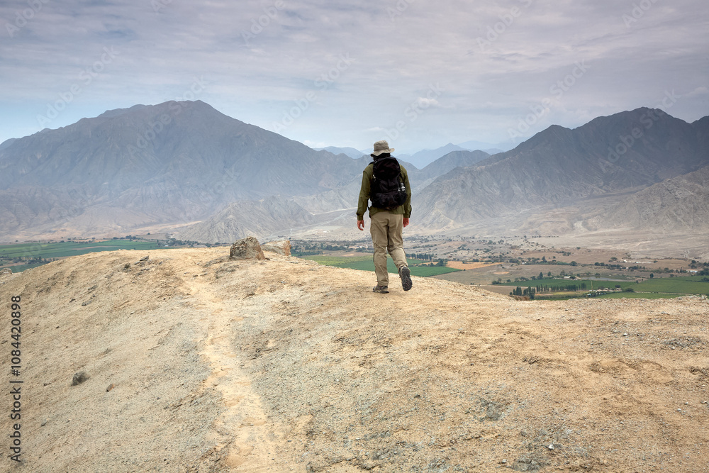 Fototapeta premium Exploring the cradle of civilization in the Americas.Caral, one of the world's oldest cities, dates back over 5,000 years. Its pyramids and complex structures remind us of the ingenuity and resilience