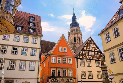 Fassaden historischer Altstadthäuser am Marktplatz und Glockenturm der Moritzkirche im Hintergrund  in Coburg, Deutschland photo