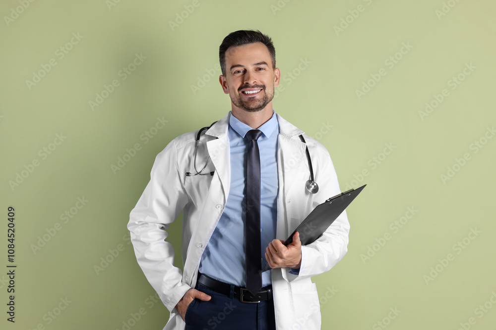 Smiling doctor with stethoscope and clipboard on olive background Smiling doctor with stethoscope and clipboard on olive background