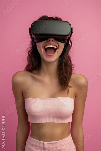 Young woman enjoying virtual reality experience in a playful setting with pin...