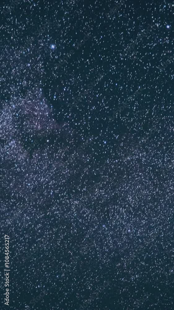 Night Starry Sky With Glowing Stars. Bright Glow Of Sky Stars. Copy Space. Natural Night Background Backdrop Time Lapse Time-Lapse Night Starry Sky With Glowing Stars. Bright Glow Of Sky Stars. Copy Space. Natural Night Background Backdrop Time Lapse Time-Lapse