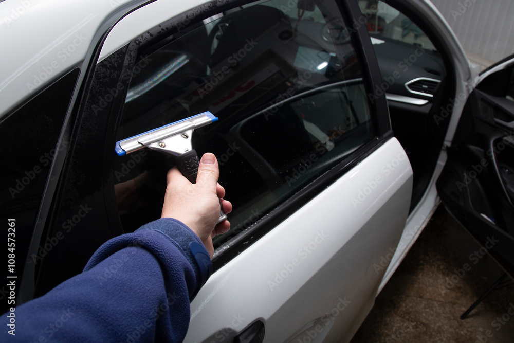 Tinting of car windows.Window film for car. Tinting of car windows.Window film for car.