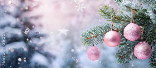 A Christmas tree with a gold ornament hanging from it