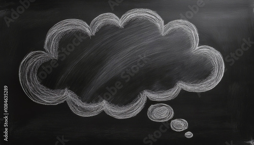 A hand-drawn of a thought blank bubble on a black chalkboard, suggesting a conceptual or imaginative theme.	