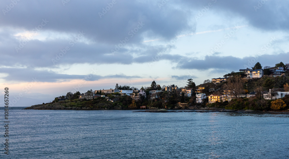 Peaceful Sunrise Over Coastal Homes in Victoria, BC