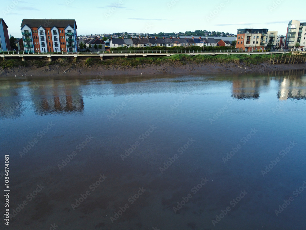Obraz premium High Angle View of Newport City on River Usk Wales, United Kingdom During Sunset. Aerial Footage Was Captured with Drone's Camera on May 27th, 2024