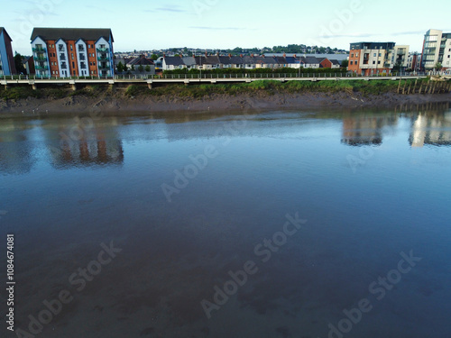 High Angle View of Newport City on River Usk Wales, United Kingdom During Sunset. Aerial Footage Was Captured with Drone's Camera on May 27th, 2024 photo