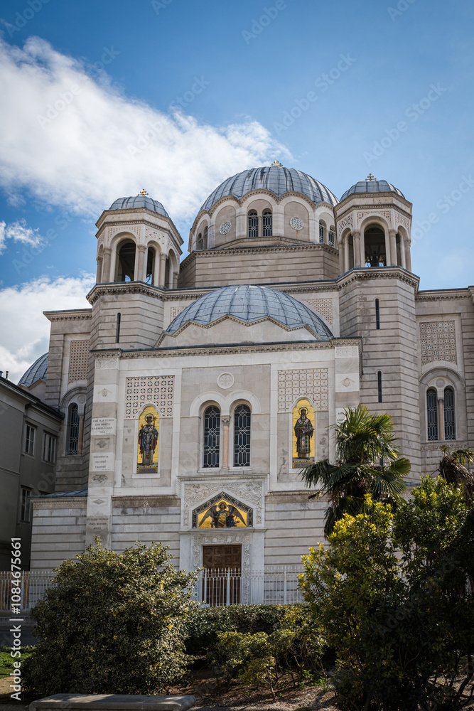Fototapeta premium Saint Spyridon Church in Trieste, Italy, a magnificent Serbian Orthodox church known for its stunning domes, mosaics, and rich history.