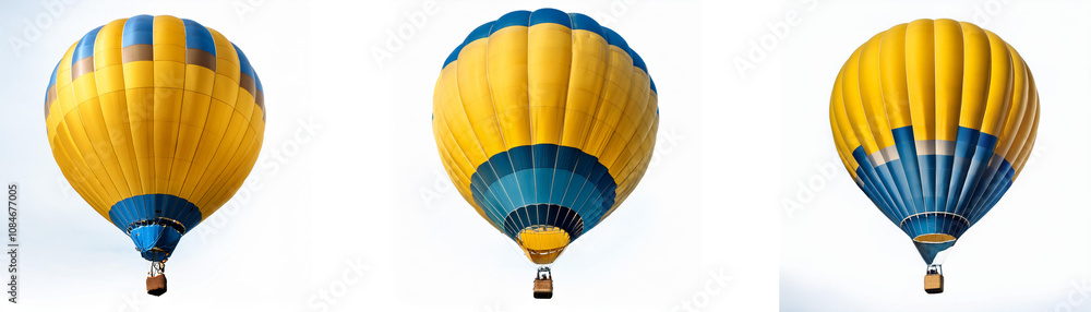 Obraz premium Three yellow and blue hot air balloons are floating in the sky.