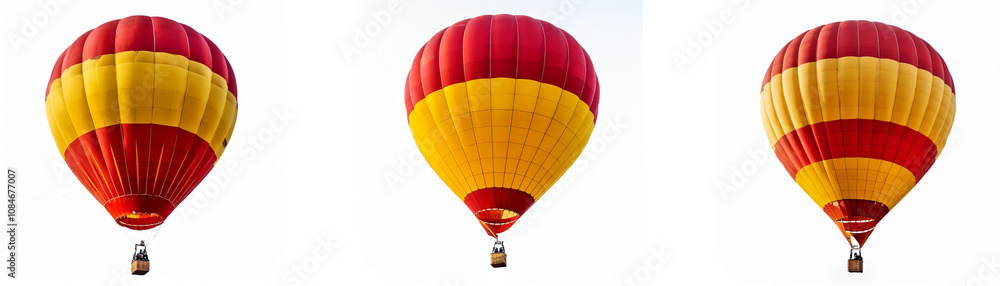 Obraz premium Three hot air balloons, each with a red and yellow striped pattern, float against a white sky.