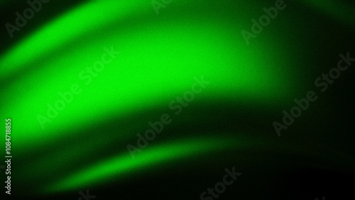 Abstract gradient featuring a bold blend of vibrant green hues with a grainy texture, creating a striking background ideal for digital designs and wallpapers