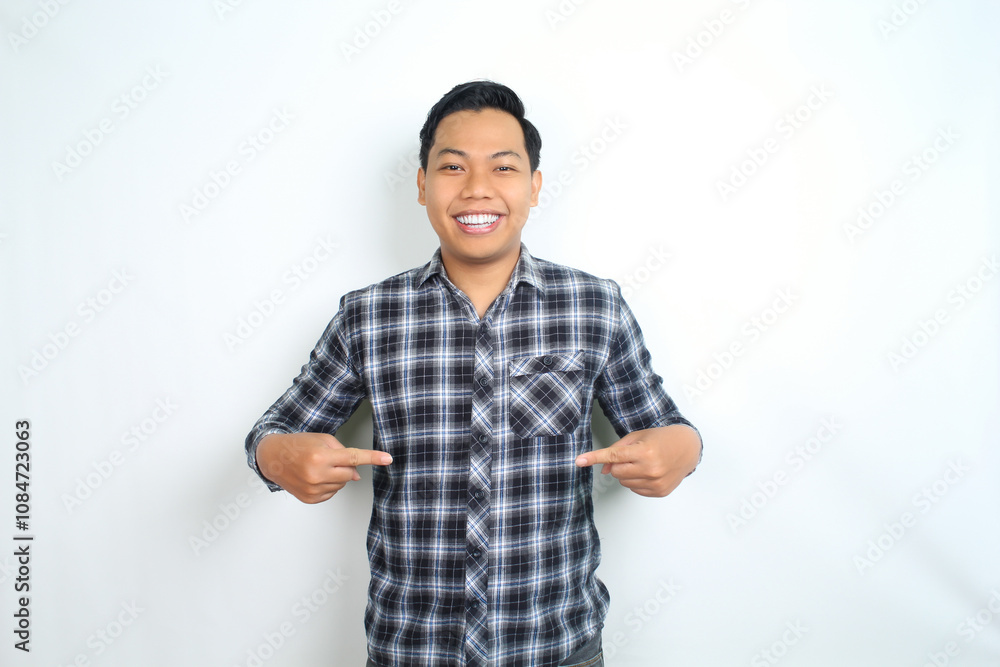 happy asian man pointing hand with smiling face and confident gesture isolated on white backgroun wearing plaid shirt happy asian man pointing hand with smiling face and confident gesture isolated on white backgroun wearing plaid shirt