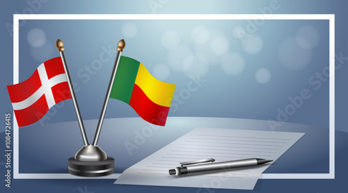 Denmark and Benin National flags on small table with bokeh background, cooperative relationship