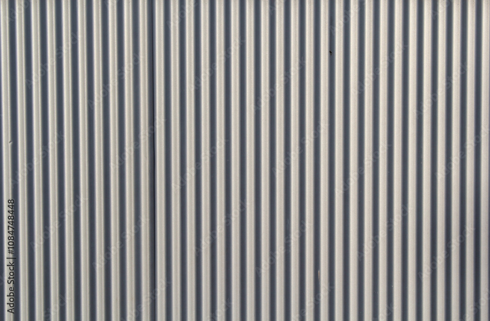 Close-up of a corrugated metal wall abstract textured background Close-up of a corrugated metal wall abstract textured background