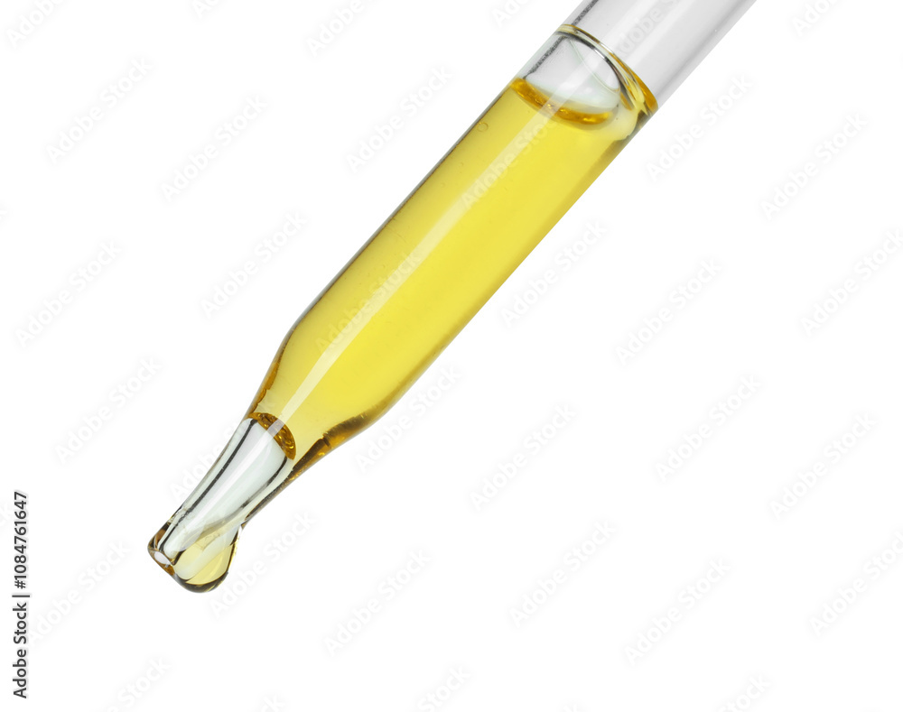 Dripping essential oil from pipette on white background Dripping essential oil from pipette on white background