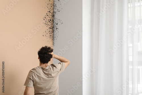 Shocked young man with mold...