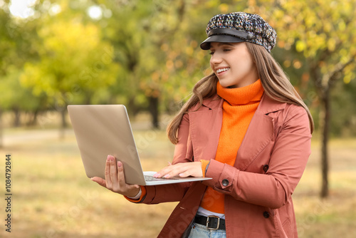 Female tourist using laptop...