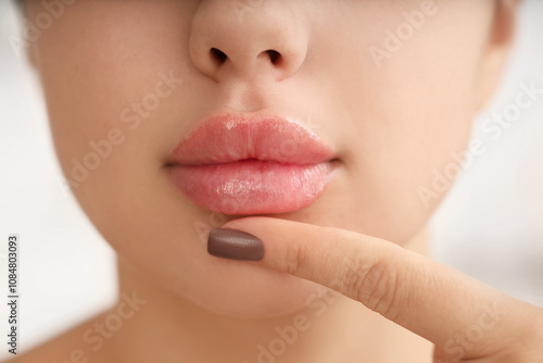 Beautiful young woman with ...