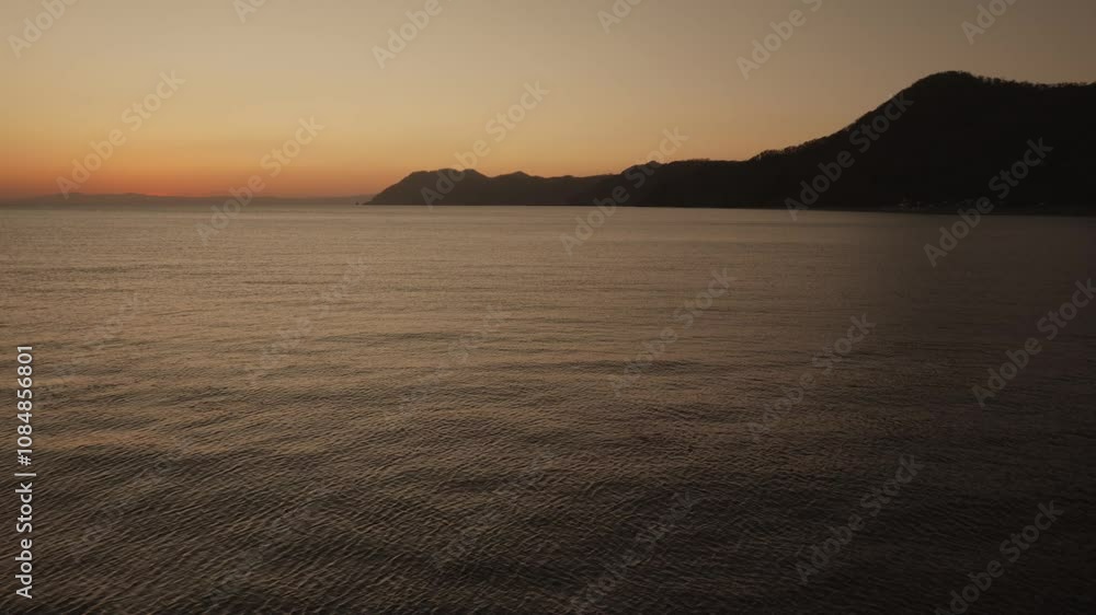 静かな入り江の夕日 静かな入り江の夕日