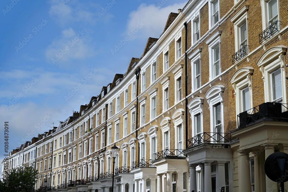 Fototapeta premium Long row of brick townhouses, London Borough of Kensington