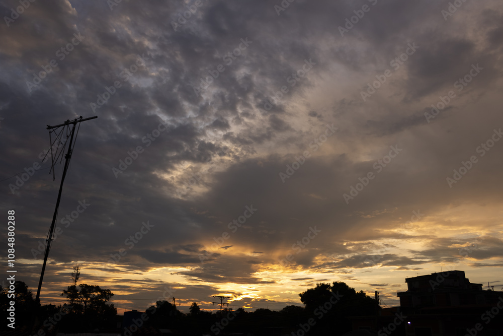 Beautiful sunset sky with clouds in the evening. Colorful sky. Beautiful sunset sky with clouds in the evening. Colorful sky.