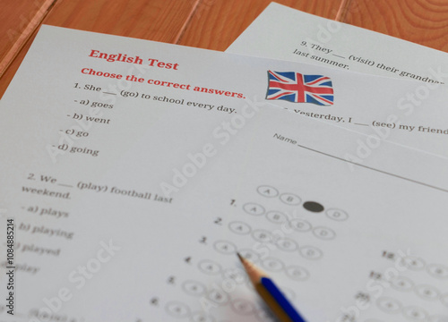 English test and bubble answer sheet on table in class