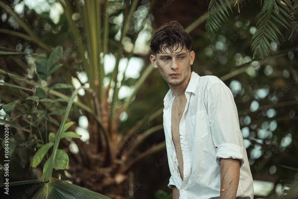 Young man with an intense expression standing in a dense jungle, wearing an open white shirt. Captures themes of survival, adventure, and determination. Ideal for high-quality promotional materials Young man with an intense expression standing in a dense jungle, wearing an open white shirt. Captures themes of survival, adventure, and determination. Ideal for high-quality promotional materials