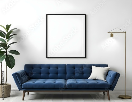 A modern living room with a navy blue tufted sofa, a blank framed wall art, and a minimalist pendant light fixture