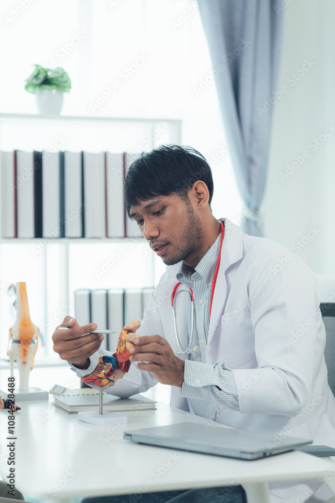 Focused Physician Examining Medical Model Focused Physician Examining Medical Model