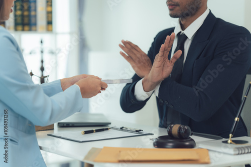 Schilderij op canvas Refusal of a Bribe: Lawyer rejecting a bribe offer during a serious business meeting