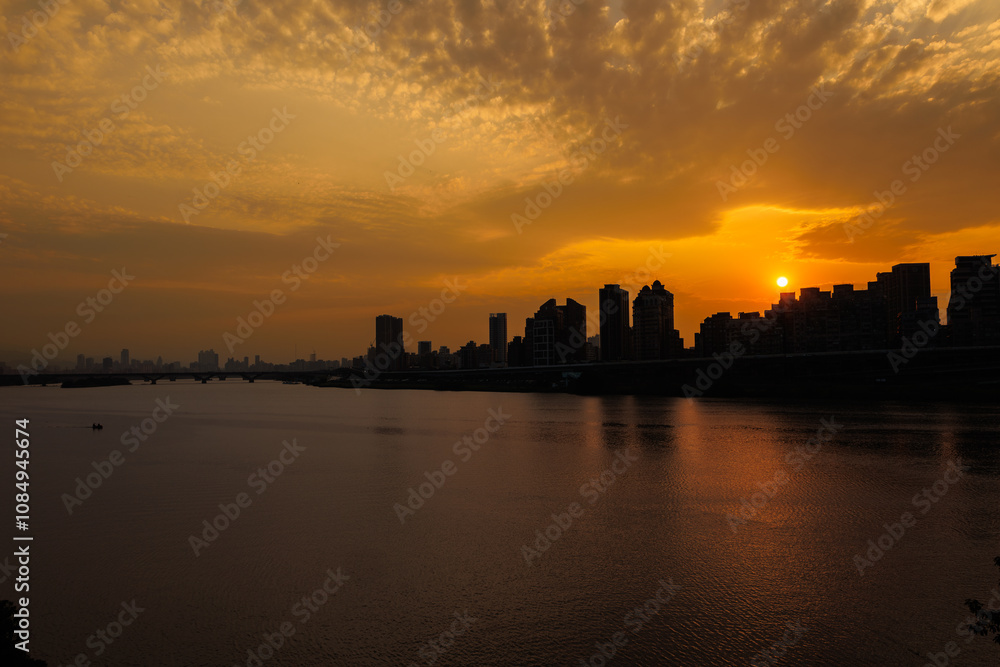 city skyline at sunset city skyline at sunset