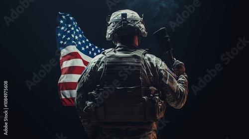 A U.S. soldier stands with his back to the camera, holding an American flag in one hand and wearing a helmet against a black background, with backlighting, dark color grading photo